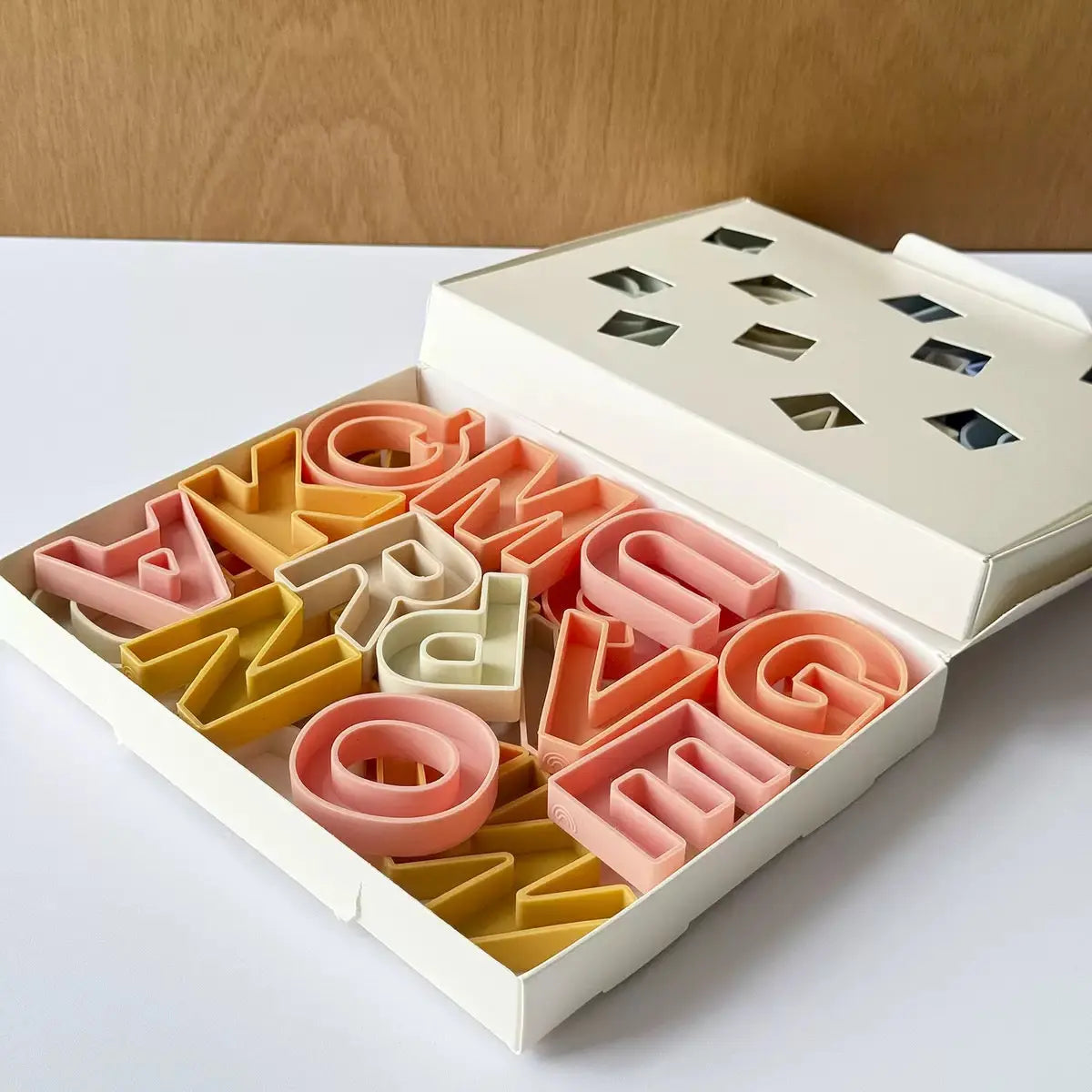 Orange silicone alphabet packaging
