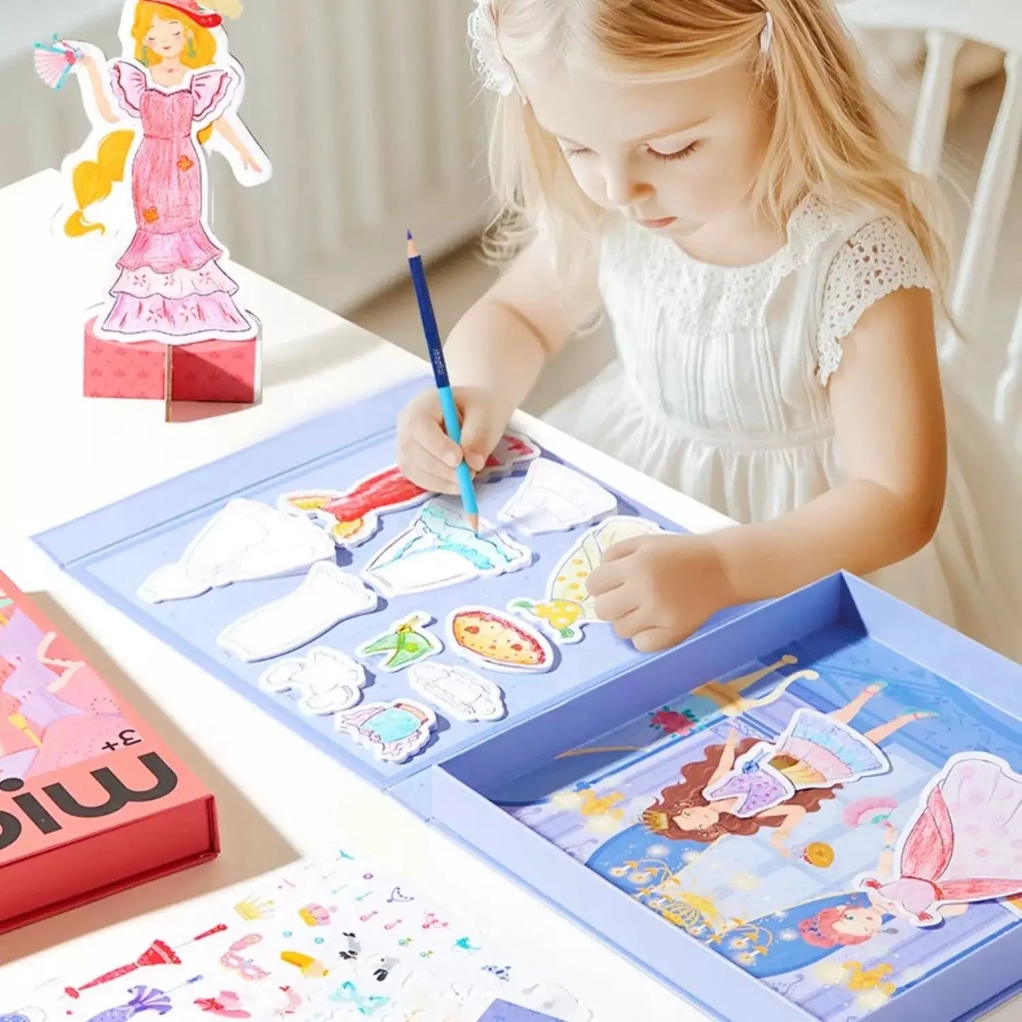 Little girl designing costume with creative costume set by mideer